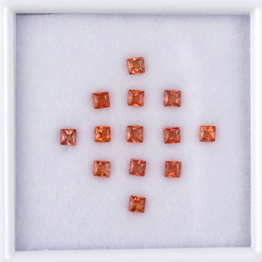1.20twt Orange Sapphire Colored Gemstone Melee Parcel Top View White Background
