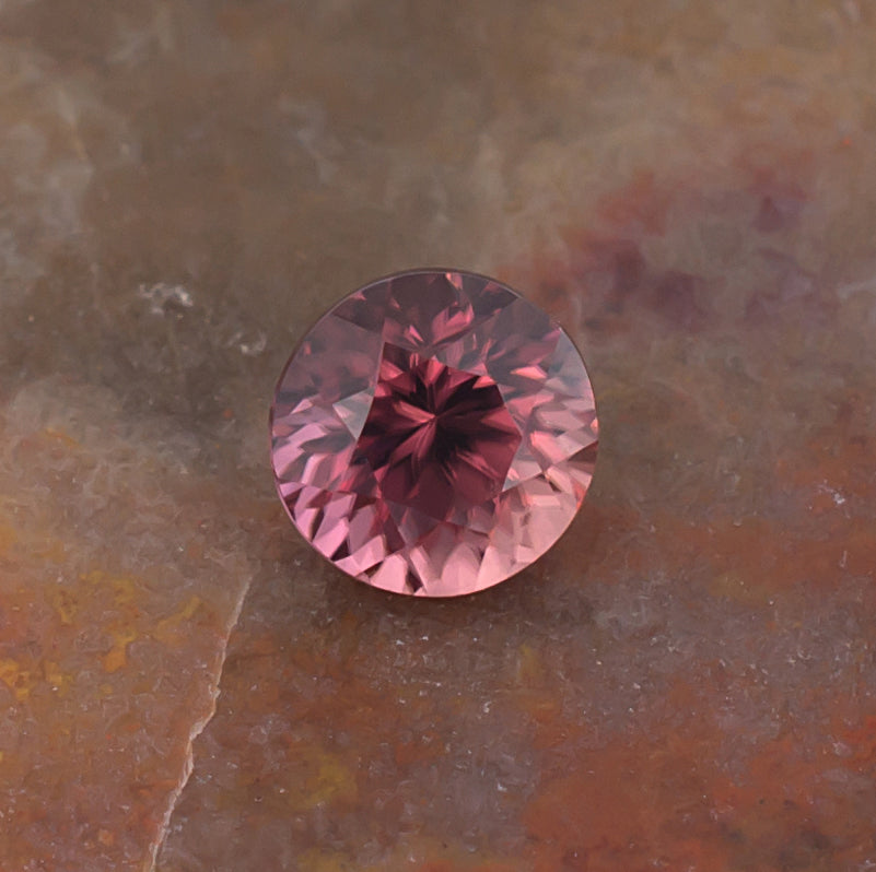 1.21ct Pink Zircon Colored Gemstone Crown View Natural Background
