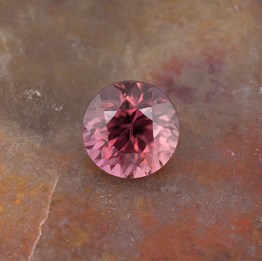1.21ct Pink Zircon Colored Gemstone Crown View Natural Background
