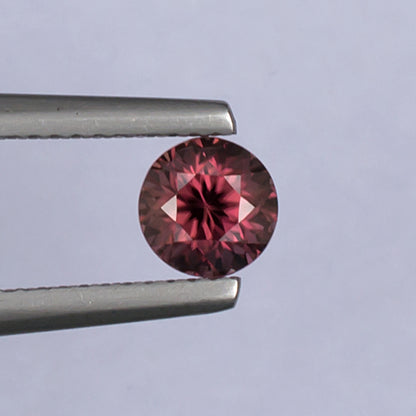 1.21ct Pink Zircon Colored Gemstone Top View White Background
