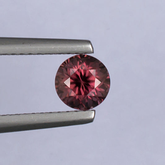 1.21ct Pink Zircon Colored Gemstone Top View White Background
