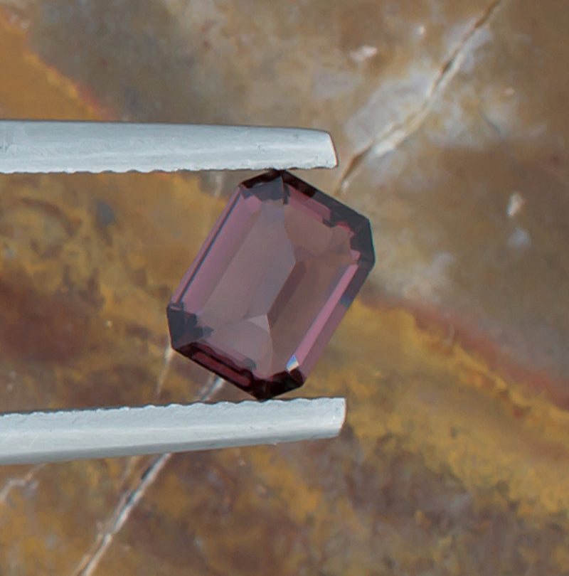 1.22ct Spinel Colored Gemstone Bottom View Natural Background 
