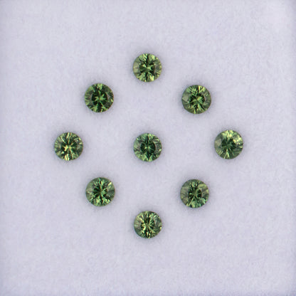 1.23twt Green Sapphire Colored Gemstone Melee Parcel Top View White Background
