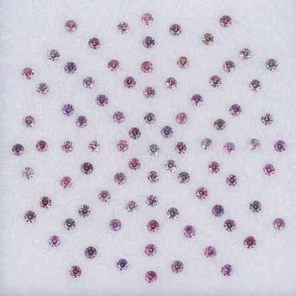 1.30mm Pink Sapphire Colored Gemstone Melee Parcel Top View White Background
