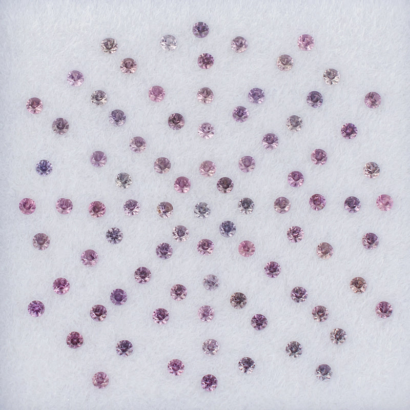 1.30mm Pink Sapphire Colored Gemstone Melee Parcel Top View White Background
