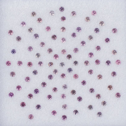 1.30mm Pink Sapphire Colored Gemstone Melee Parcel Top View White Background
