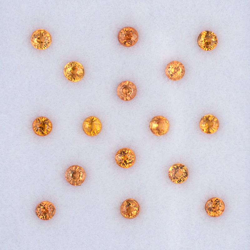 1.41twt Orange Sapphire Colored Gemstone Melee Parcel Top View White Background
