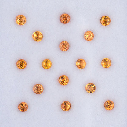1.41twt Orange Sapphire Colored Gemstone Melee Parcel Top View White Background
