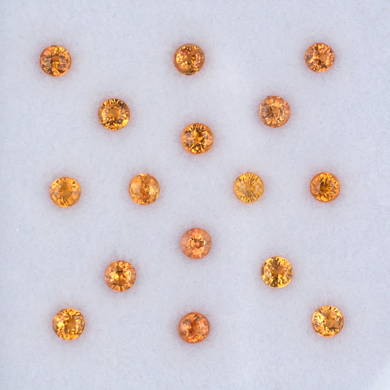1.41twt Orange Sapphire Colored Gemstone Melee Parcel Top View White Background
