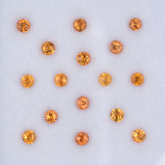 1.41twt Orange Sapphire Colored Gemstone Melee Parcel Top View White Background
