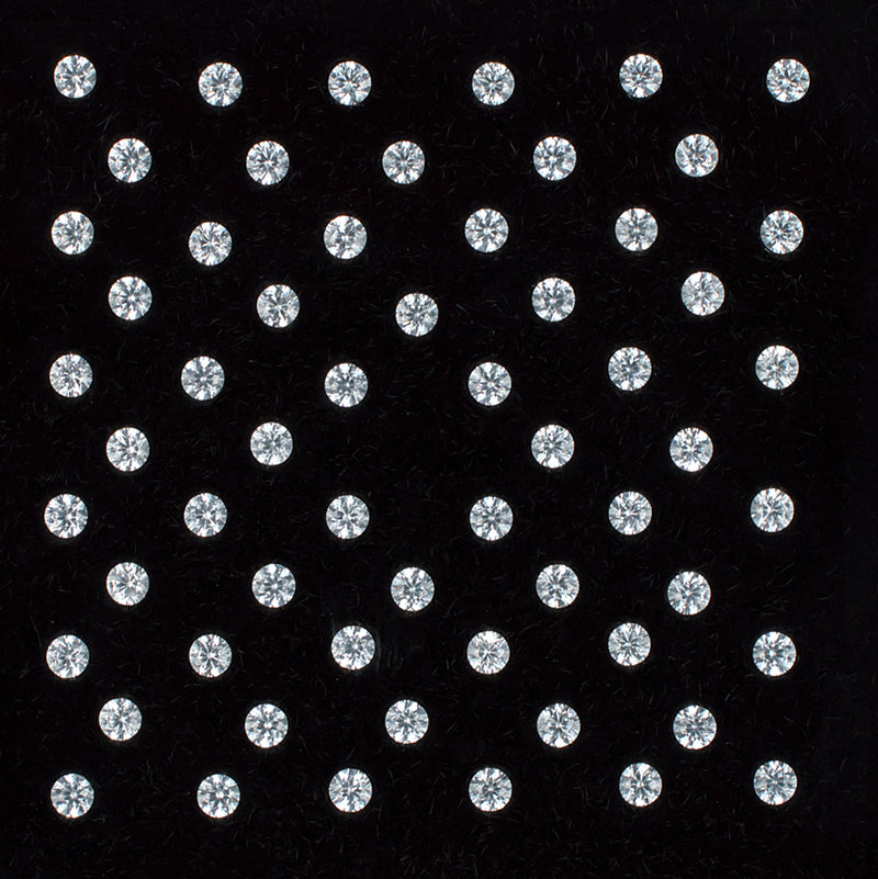 1.50mm White Topaz Gemstone Melee Parcel Top View Black Background
