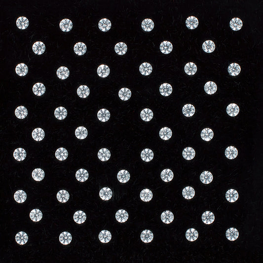 1.50mm White Topaz Gemstone Melee Parcel Top View Black Background
