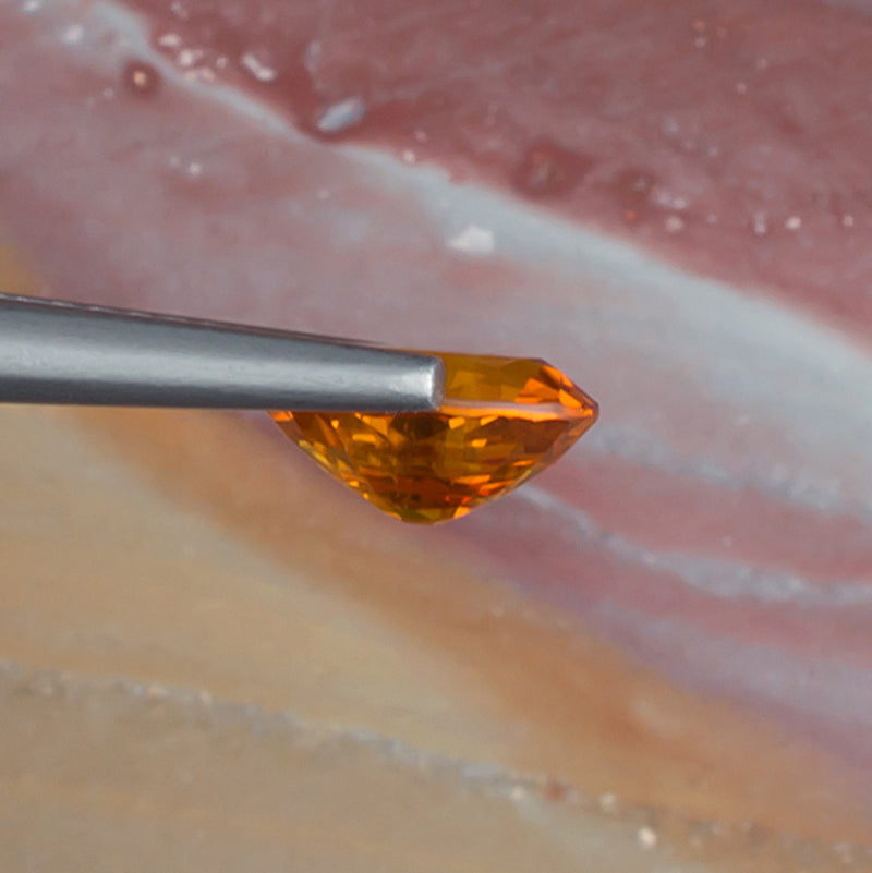 1.51ct Yellow Sapphire Colored Gemstone Side View Natural Background 
