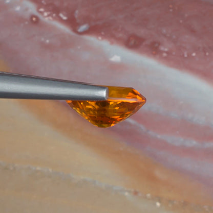 1.51ct Yellow Sapphire Colored Gemstone Side View Natural Background 
