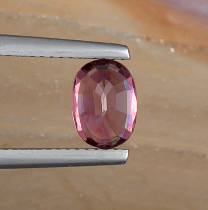 1.64ct Pink Spinel Colored Gemstone Bottom View Natural Background 

