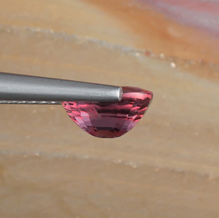 1.64ct Pink Spinel Colored Gemstone Side View Natural Background 
