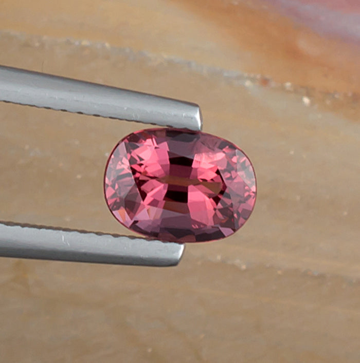 1.64ct Pink Spinel Colored Gemstone Top View Natural Background 
