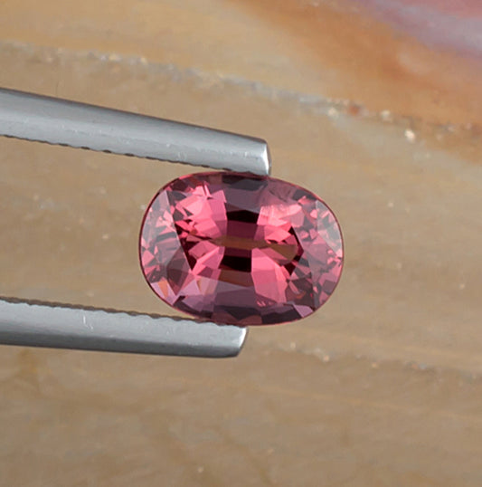 1.64ct Pink Spinel Colored Gemstone Top View Natural Background 
