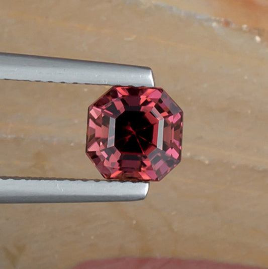 1.67ct Red Pink Tourmaline Colored Gemstone Top View Natural Background
