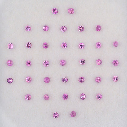 1.70mm Pink Sapphire Colored Gemstone Melee Parcel Top View White Background
