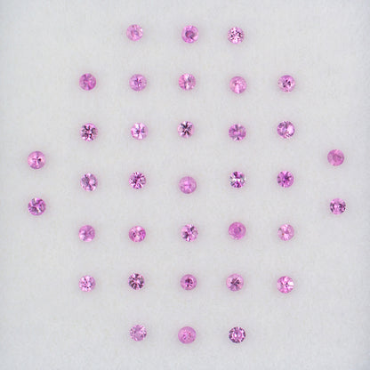 1.70mm Pink Sapphire Colored Gemstone Melee Parcel Top View White Background
