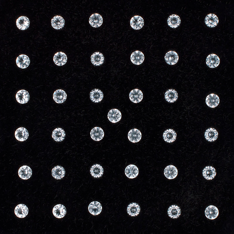 1.80mm White Topaz Gemstone Melee Parcel Top View Black Background A 21342
