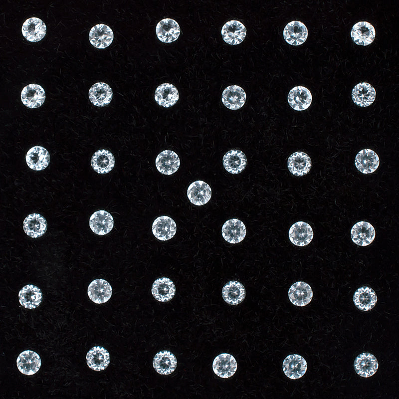 1.80mm White Topaz Gemstone Melee Parcel Top View Black Background A 21342
