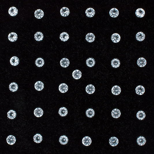 1.80mm White Topaz Gemstone Melee Parcel Top View Black Background A 21342
