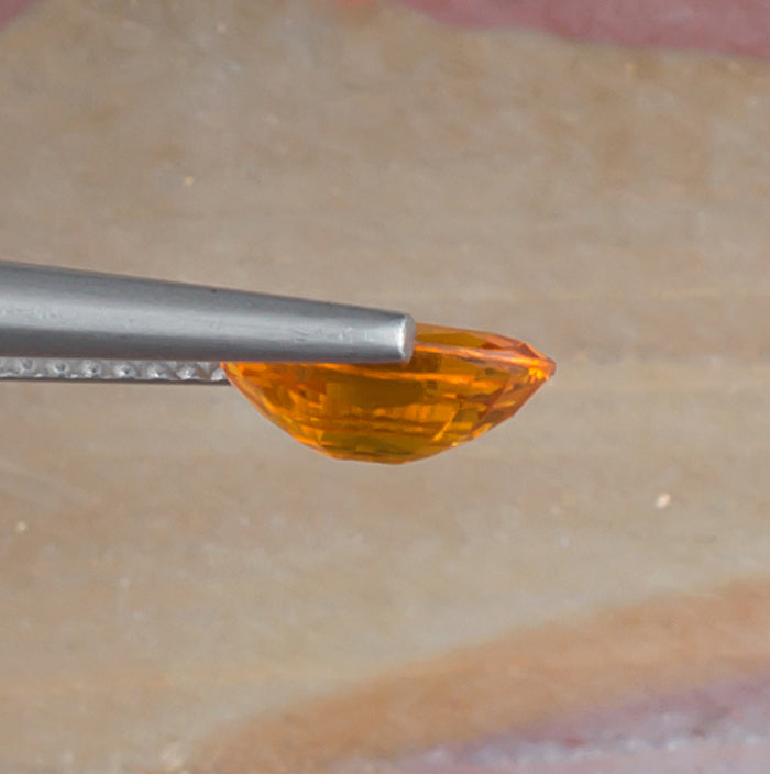 1.81ct Yellow Sapphire Colored Gemstone Side View Natural Background 
