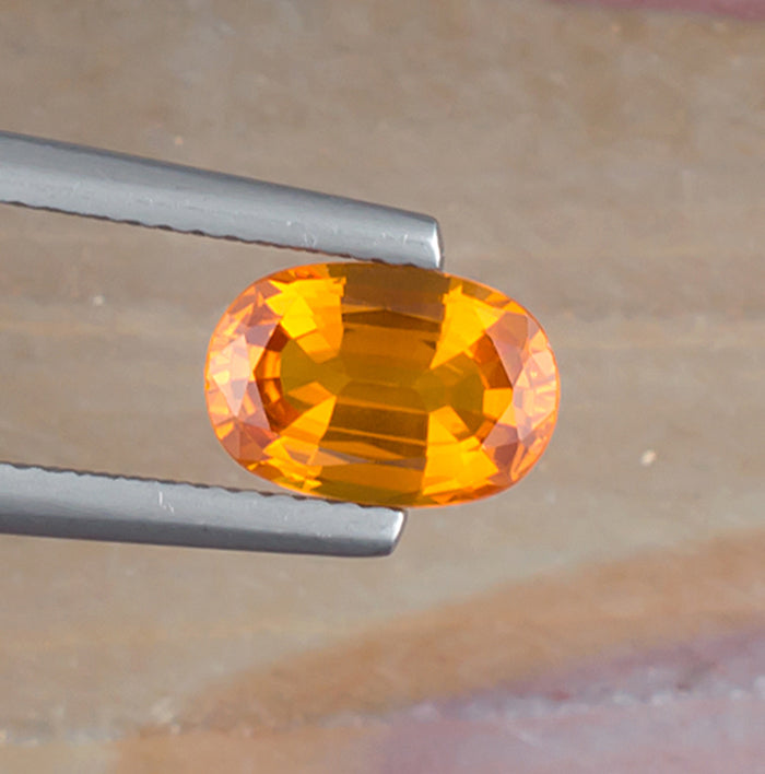 1.81ct Yellow Sapphire Colored Gemstone Top View II Natural Background 
