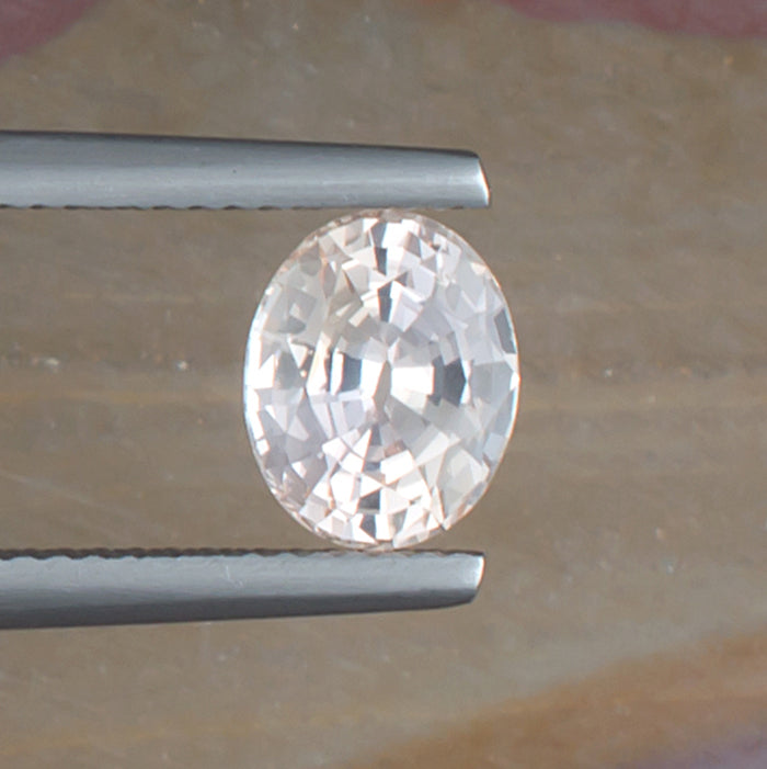 1.99ct Fancy Sapphire Colored Gemstone Top View Natural Background 
