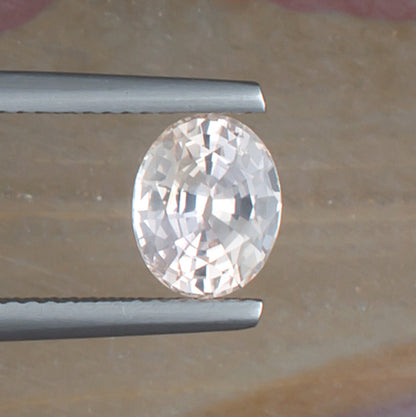 1.99ct Fancy Sapphire Colored Gemstone Top View Natural Background 

