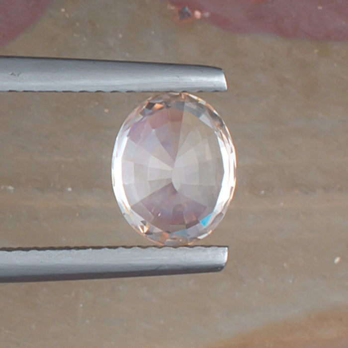 1.99ct Fancy Sapphire Colored Gemstone bottom View Natural Background 
