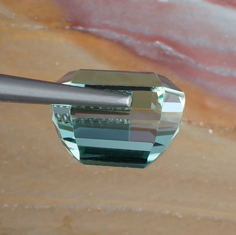 10.80ct Hiddenite Spodumene Side View Natural Background 
