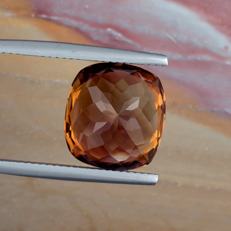 11.66ct Precious Topaz Colored Gemstone Bottom View Natural Background 
