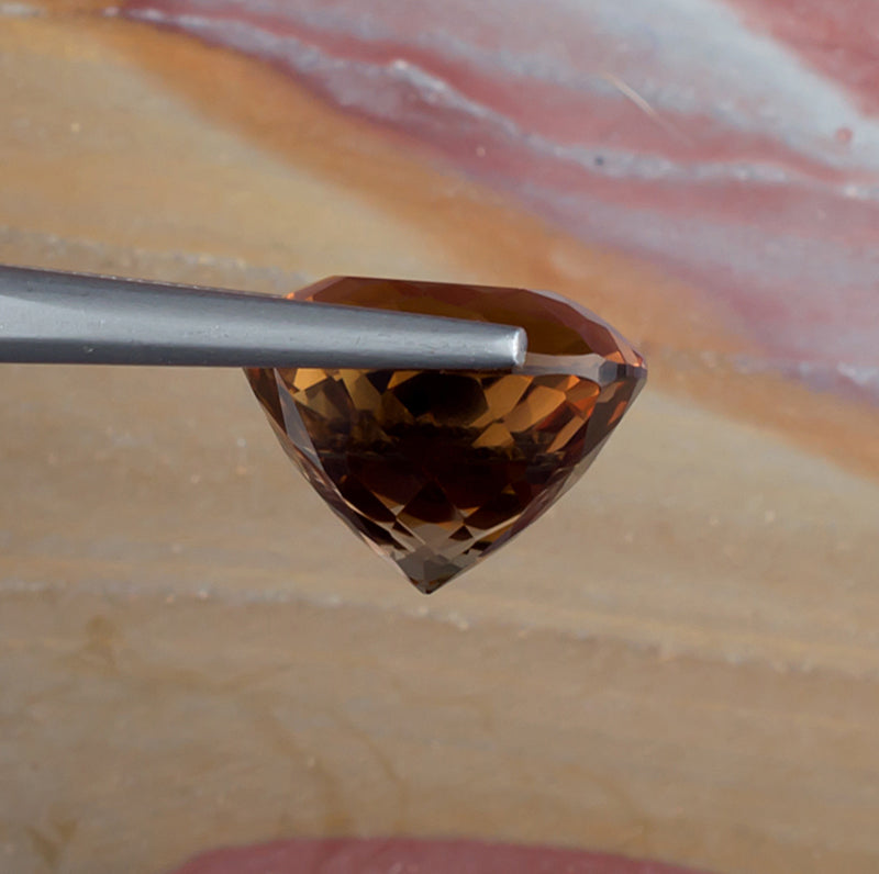 11.66ct Precious Topaz Colored Gemstone Side View Natural Background 

