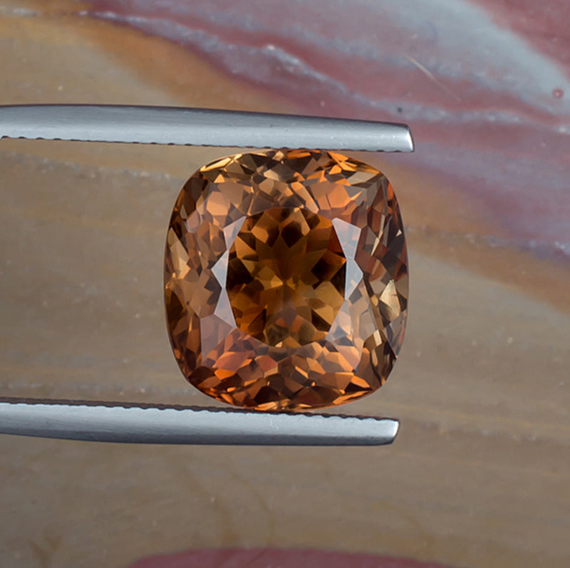 11.66ct Precious Topaz Colored Gemstone Top View Natural Background 
