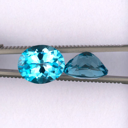 11.87twt Blue Topaz Colored Gemstone Pair Top Side View White Background
