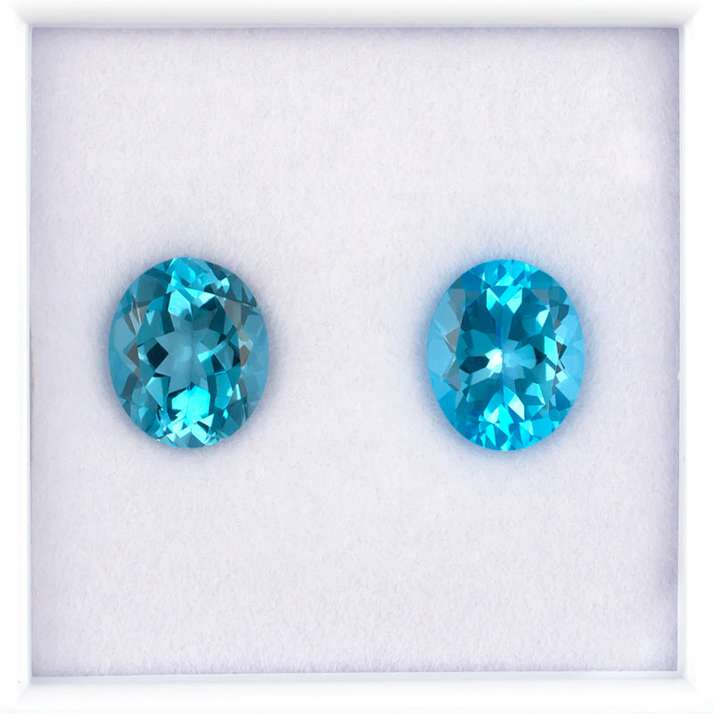 11.87twt Blue Topaz Colored Gemstone Pair Top View White Background
