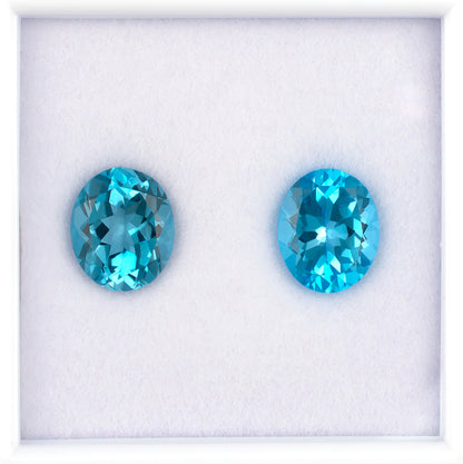 11.87twt Blue Topaz Colored Gemstone Pair Top View White Background
