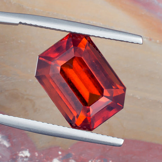 12.02ct Hessonite Garnet Colored Gemstone Top View White Background

