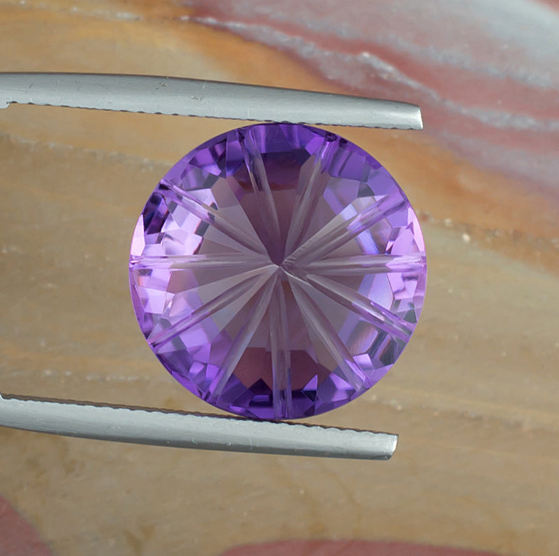 12.20ct Amethyst Colored Gemstone Bottom View Natural Background 
