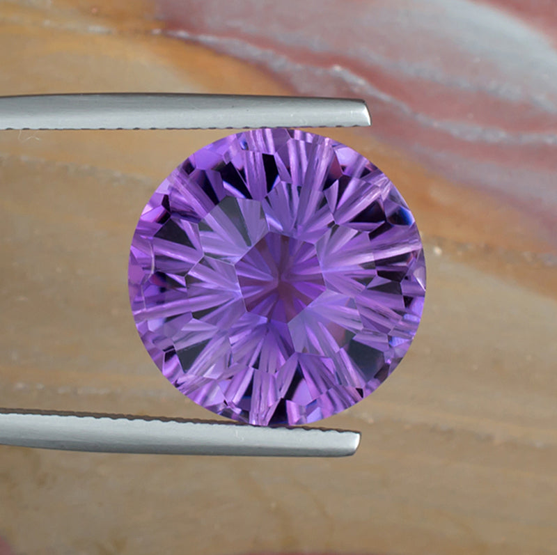 12.20ct Amethyst Colored Gemstone Top View Natural Background 
