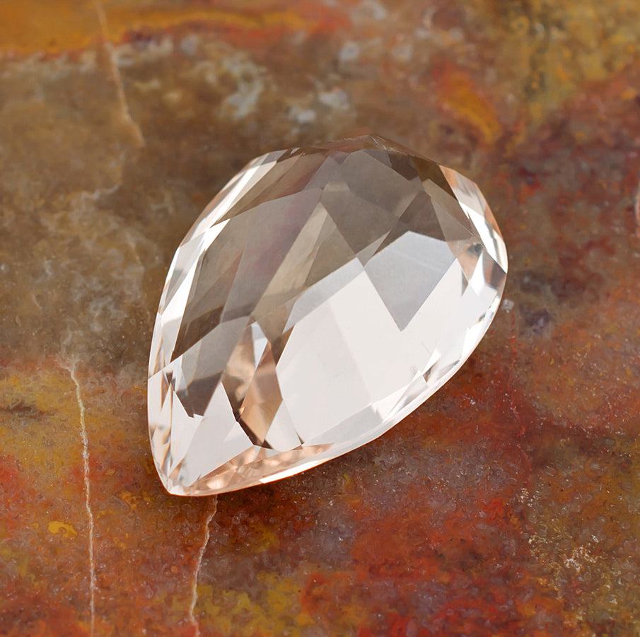 12.64ct Morganite Colored Gemstone Side View Natural Background M 21439
