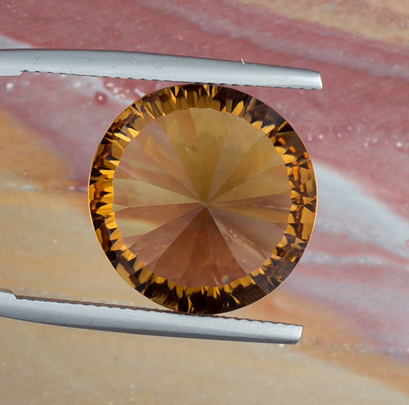 14.36ct Citrine Colored Gemstone Bottom View Natural Background 
