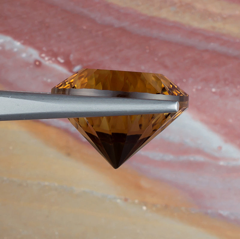 14.36ct Citrine Colored Gemstone Side View Natural Background 
