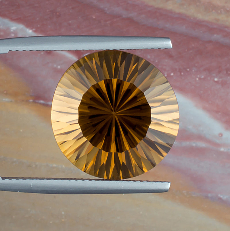 14.36ct Citrine Colored Gemstone Top View Natural Background
