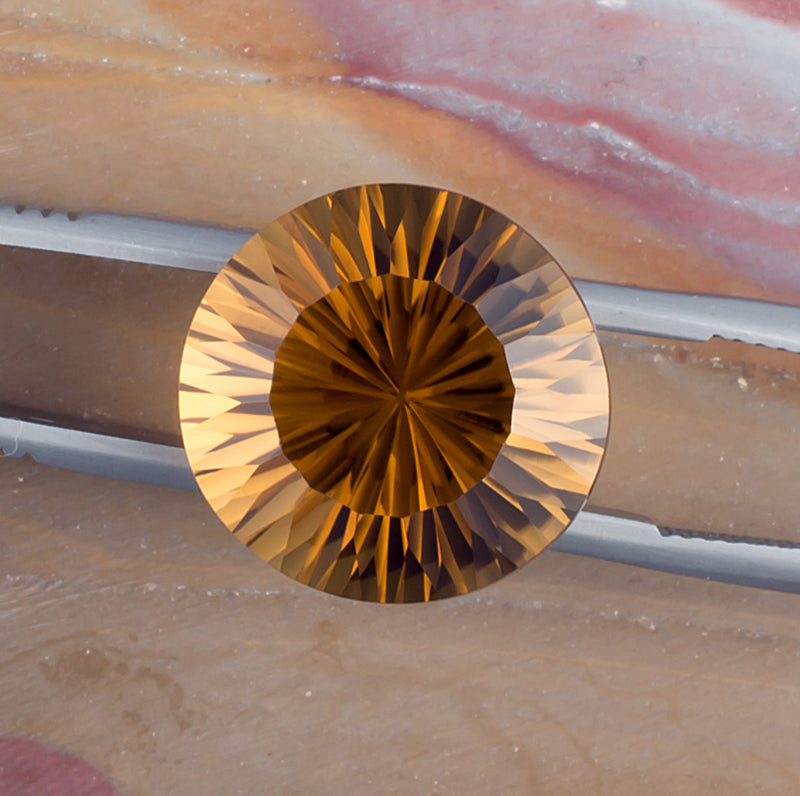 14.36ct Citrine Colored Gemstone Top View Natural Background 

