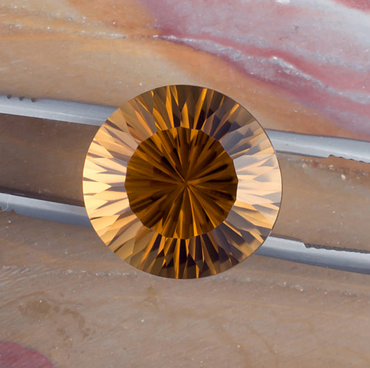 14.36ct Citrine Colored Gemstone Top View Natural Background 
