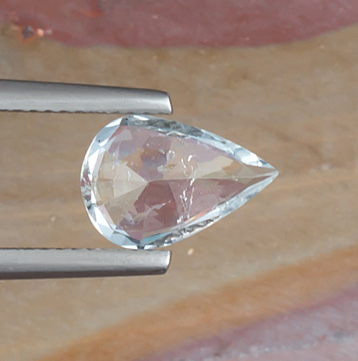 2.08ct Aquamarine Colored Gemstone Bottom View Natural Background 

